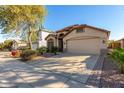 House exterior with driveway and landscaping at 22421 N 19Th Way, Phoenix, AZ 85024