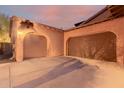 Two-car garage with attached storage space at 30213 N 124Th Ln, Peoria, AZ 85383