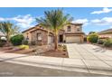 Two-story home with a three-car garage and desert landscaping at 3457 E Virgil Dr, Gilbert, AZ 85298