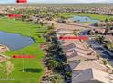Aerial view of a luxury home community near a golf course at 36709 N Stoneware Dr, San Tan Valley, AZ 85140