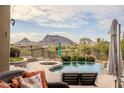 Relaxing pool area with mountain views and comfortable seating at 12026 N 138Th St, Scottsdale, AZ 85259