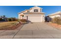 Two-story house with a two-car garage and manicured lawn at 1220 W Gail Ct, Chandler, AZ 85224