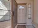 Front door entry with security door and sidelights at 1354 E Brentrup Dr, Tempe, AZ 85283