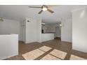 Bright dining area with tile floors and ceiling fan at 19777 N 76Th St # 2292, Scottsdale, AZ 85255