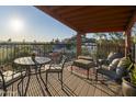 Spacious balcony with city views, seating area, and table at 2235 E Vista Ave, Phoenix, AZ 85020