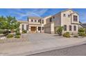 Two-story house with a large driveway and landscaping at 22830 N 32Nd Ln, Phoenix, AZ 85027