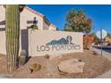 Los Portones community entrance with attractive landscaping and signage at 23570 N 75Th N St, Scottsdale, AZ 85255