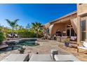 Inviting backyard oasis with a sparkling pool and relaxing patio area at 24029 N 76Th Pl, Scottsdale, AZ 85255