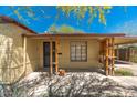 Front porch of a brick home with wood accents at 2434 E Pinchot Ave, Phoenix, AZ 85016