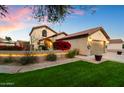 Stunning two-story home with a well-manicured lawn and charming landscaping at 3720 E South Fork Dr, Phoenix, AZ 85044