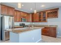 Spacious kitchen with granite countertops, stainless steel appliances, and wood cabinets at 4444 E Peach Tree Dr, Chandler, AZ 85249