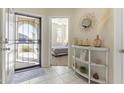 Bright entryway with a view of a bedroom and decorative console table at 4916 E Rhodium Dr, San Tan Valley, AZ 85143