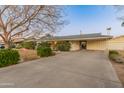 House exterior showcasing covered entry and well-maintained landscaping at 6627 N 16Th Dr, Phoenix, AZ 85015