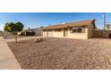 Front yard view of a single story home with gravel landscaping at 7118 E Arbor Ave, Mesa, AZ 85208