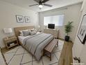 Comfortable main bedroom with wood floors and plenty of light at 749 E Montebello Ave # 130, Phoenix, AZ 85014