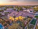 Luxury estate featuring a large backyard oasis with pool and sports court at 815 E County Down Dr, Chandler, AZ 85249