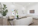 Inviting living room showcases elegant decor, modern furniture, and a serene ambiance at 9031 N 83Rd Way, Scottsdale, AZ 85258