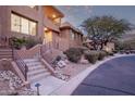 Front view of a contemporary home with landscaping and walkway at 10222 E Southwind Ln # 1026, Scottsdale, AZ 85262