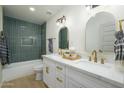 Elegant bathroom with double vanity and a modern bathtub at 2003 E Magdalena Dr, Tempe, AZ 85283