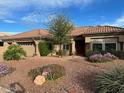 Single story home with desert landscaping at 21413 N 159Th Dr, Sun City West, AZ 85375