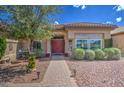 Front entry of the house with walkway at 21413 N 159Th Dr, Sun City West, AZ 85375