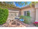 Small patio with table and chairs at 21413 N 159Th Dr, Sun City West, AZ 85375