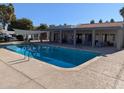 Inviting community pool with surrounding patio seating at 2524 S El Paradiso -- # 76, Mesa, AZ 85202