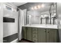 Spa-like bathroom with double vanity and hexagon tile shower at 30061 N 70Th Dr, Peoria, AZ 85383