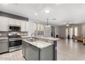 Modern kitchen with granite countertops and stainless steel appliances at 30061 N 70Th Dr, Peoria, AZ 85383