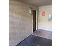 Building entry with tile floor and fire safety features at 3031 N Civic Center Plz # 130, Scottsdale, AZ 85251