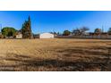 Large grassy backyard with detached workshop at 4321 W Greenway Rd, Glendale, AZ 85306