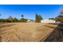 Spacious backyard, detached shop, mature trees at 4321 W Greenway Rd, Glendale, AZ 85306