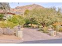 Brick driveway leading to a home with mountain views at 4529 E Clearwater Pkwy, Paradise Valley, AZ 85253