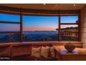 Living room with curved window offering panoramic city views at 6836 N 36Th St, Phoenix, AZ 85018