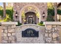 An upscale neighborhood address stone marker with the home's address welcomes residents and visitors at 6876 S Star Dr, Gilbert, AZ 85298