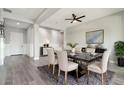 Elegant dining room featuring a marble table and modern chairs at 10709 E Thornton Ave, Mesa, AZ 85212