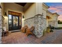 Relaxing front porch with wicker chairs at 27931 N Montana Dr, Rio Verde, AZ 85263