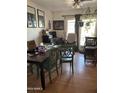 Dining area with table and chairs near sliding glass door at 4038 W Morrow Dr, Glendale, AZ 85308