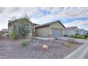 One-story home with desert landscaping and a two-car garage at 4347 W White Horse Blvd, Eloy, AZ 85131