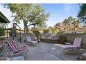 Relaxing patio with seating area, fountain, and mountain views at 5160 N 45Th Pl, Phoenix, AZ 85018