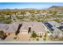 Luxury home with solar panels and mountain views in a residential community at 5626 E Sleepy Ranch Rd, Cave Creek, AZ 85331