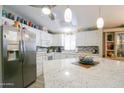 Spacious kitchen featuring granite countertops and stainless steel appliances at 5735 E Mcdowell Rd # 38, Mesa, AZ 85215