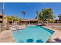 Inviting community pool with ample deck space for lounging at 5877 N Granite Reef Rd # 2225, Scottsdale, AZ 85250