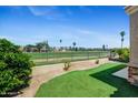 Home backs to golf course with putting green views at 6202 E Mckellips Rd # 83, Mesa, AZ 85215