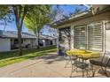 Relaxing patio with a bistro set and views of the surrounding area at 7950 E Keats Ave # 170, Mesa, AZ 85209