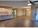 Open living area with wood-look floors and sliding door access to patio at 8020 E Keats Ave # 314, Mesa, AZ 85209