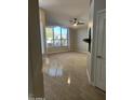 Open living room with large window and hardwood flooring at 917 E Betsy Ln, Gilbert, AZ 85296