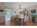 Dining room with a wooden table and hutch at 9719 W Pineridge Dr, Sun City, AZ 85351