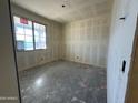 Unfinished bedroom with window and closet at 22852 E Lords Way, Queen Creek, AZ 85142