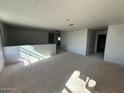 Unfinished bedroom with drywall and window at 32091 N Saddlehorn Dr, San Tan Valley, AZ 85140